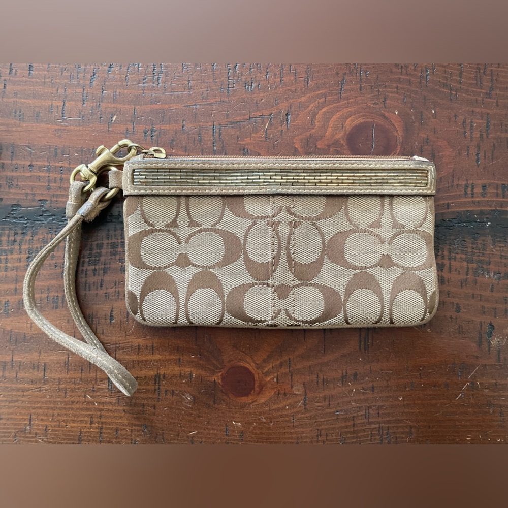 Vintagege Coach monogrammed wristlet w/ bead work leather trim ~